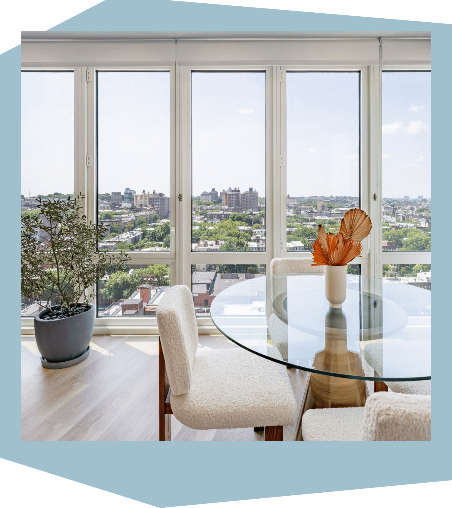 View from inside an apartment at 595 Dean St looking out at Prospect Heights with the dining area in the foreground.